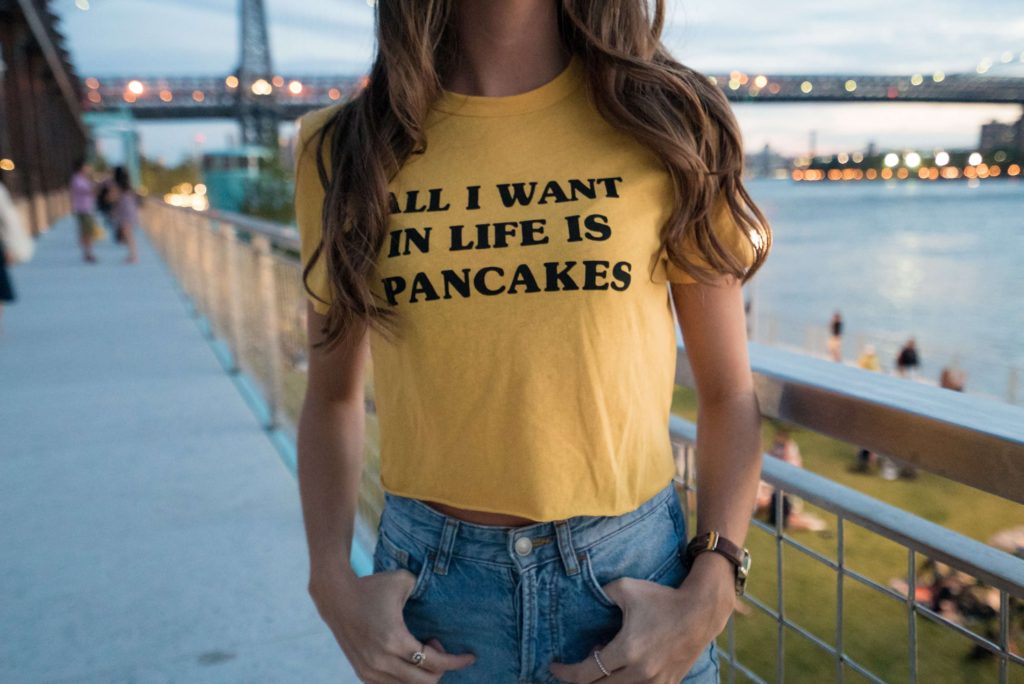 Girl wearing a tshirt form print on demand
